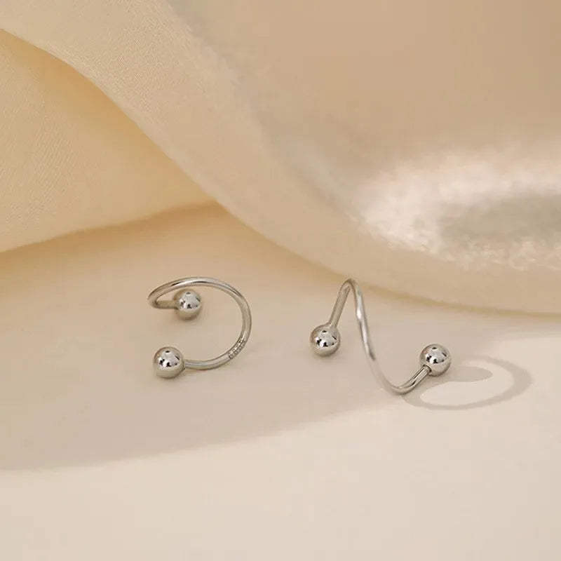 Twist Heart – Trendige Spiral-Ohrstecker aus Edelstahl