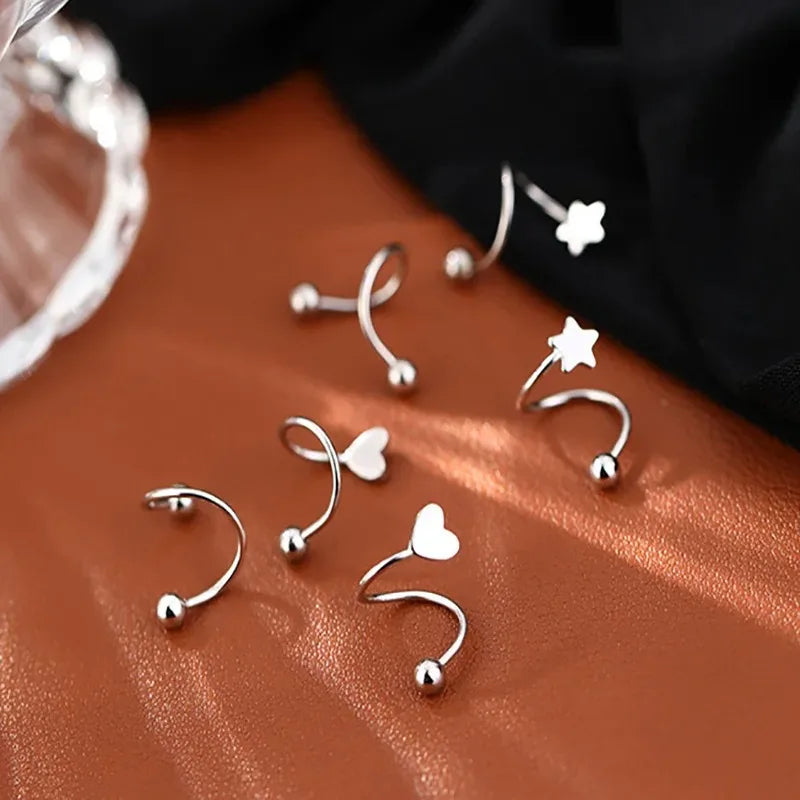 Twist Heart – Trendige Spiral-Ohrstecker aus Edelstahl