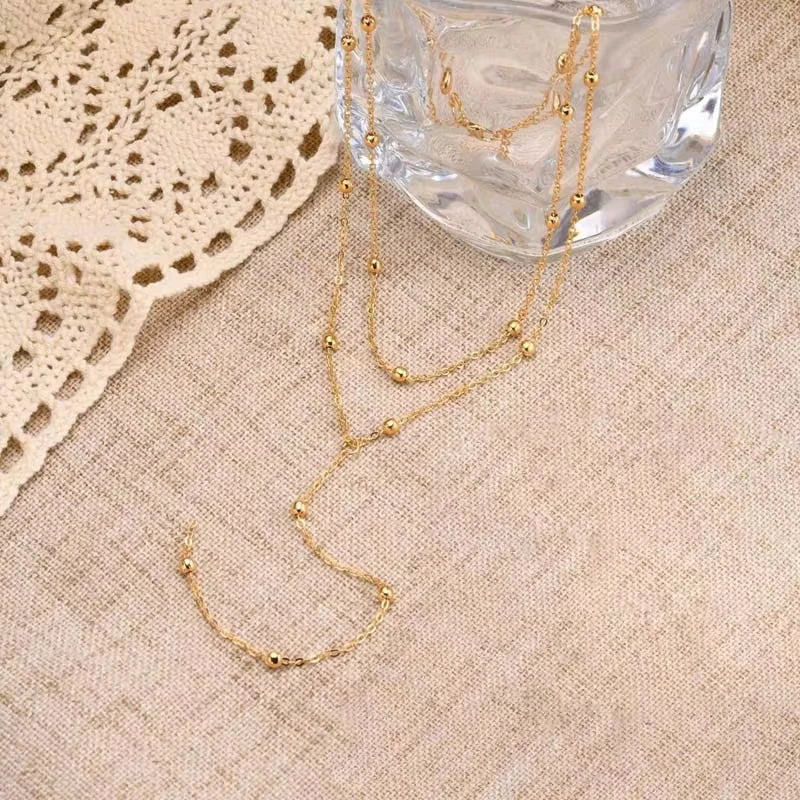 ✨ Golden Elegance – Elegante Y-Halskette