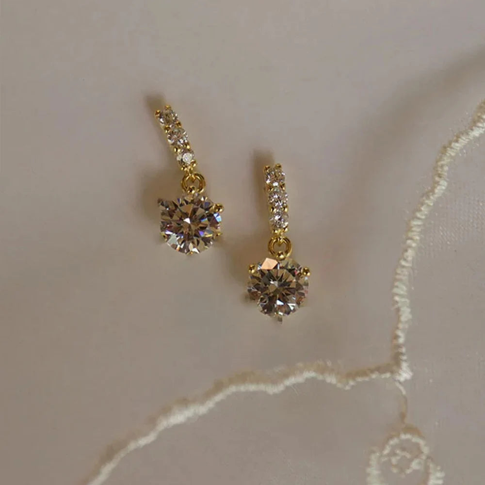Kristallschleife™ – Elegante Gold-Ohrringe