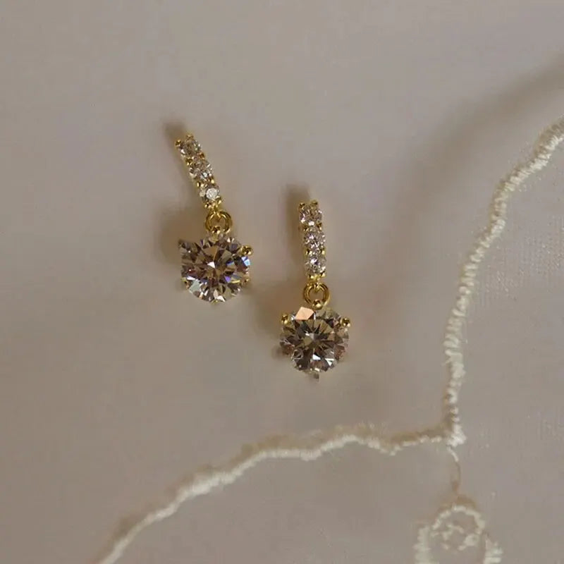 Kristallschleife™ – Elegante Gold-Ohrringe