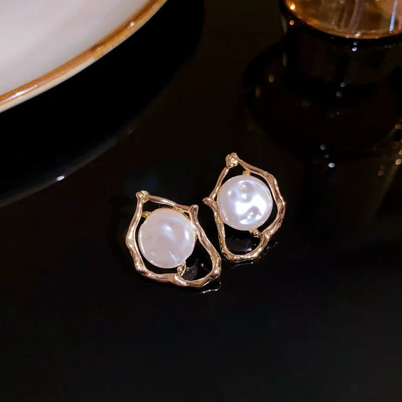Pearl Love – Elegante Perlen-Herz-Ohrstecker