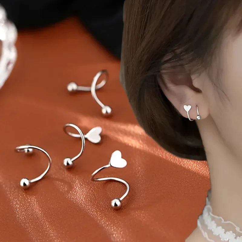 Twist Heart – Trendige Spiral-Ohrstecker aus Edelstahl